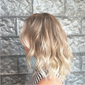 Model with warm blonde hair.